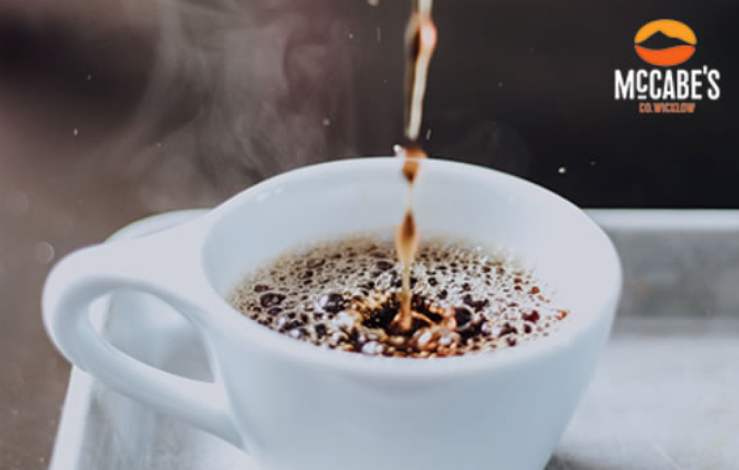McCabe's coffee being poured into a white ceramic mug